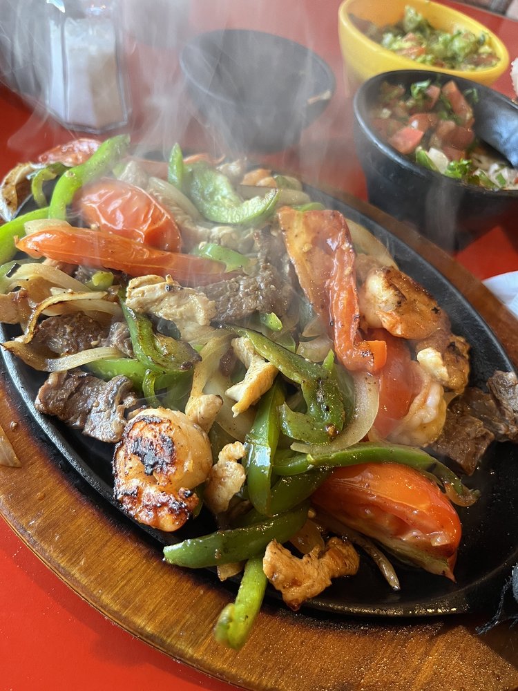 Sizzling mixed fajitas from La Lupita